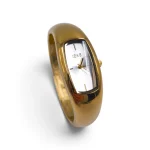 IEKE Luxe Bangle: Ατσάλινο Γυναικείο Ρολόι-Κόσμημα Χειροπέδα, Χρυσό - WW-1499